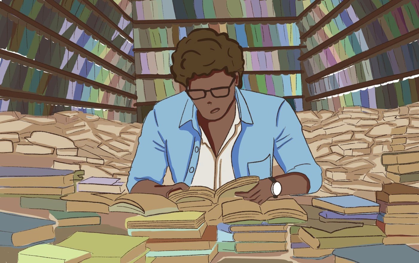 A student reading in a library buried in books